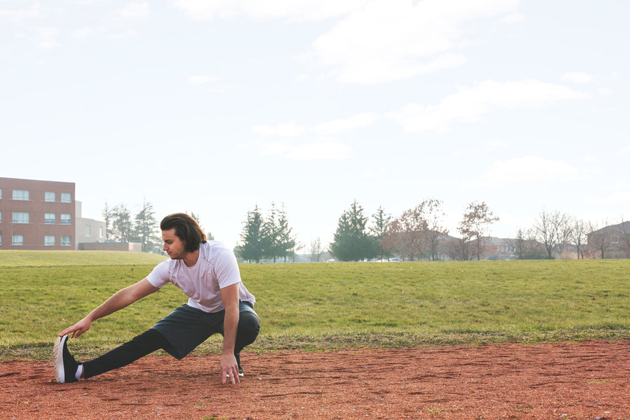 A man stretching after a run
